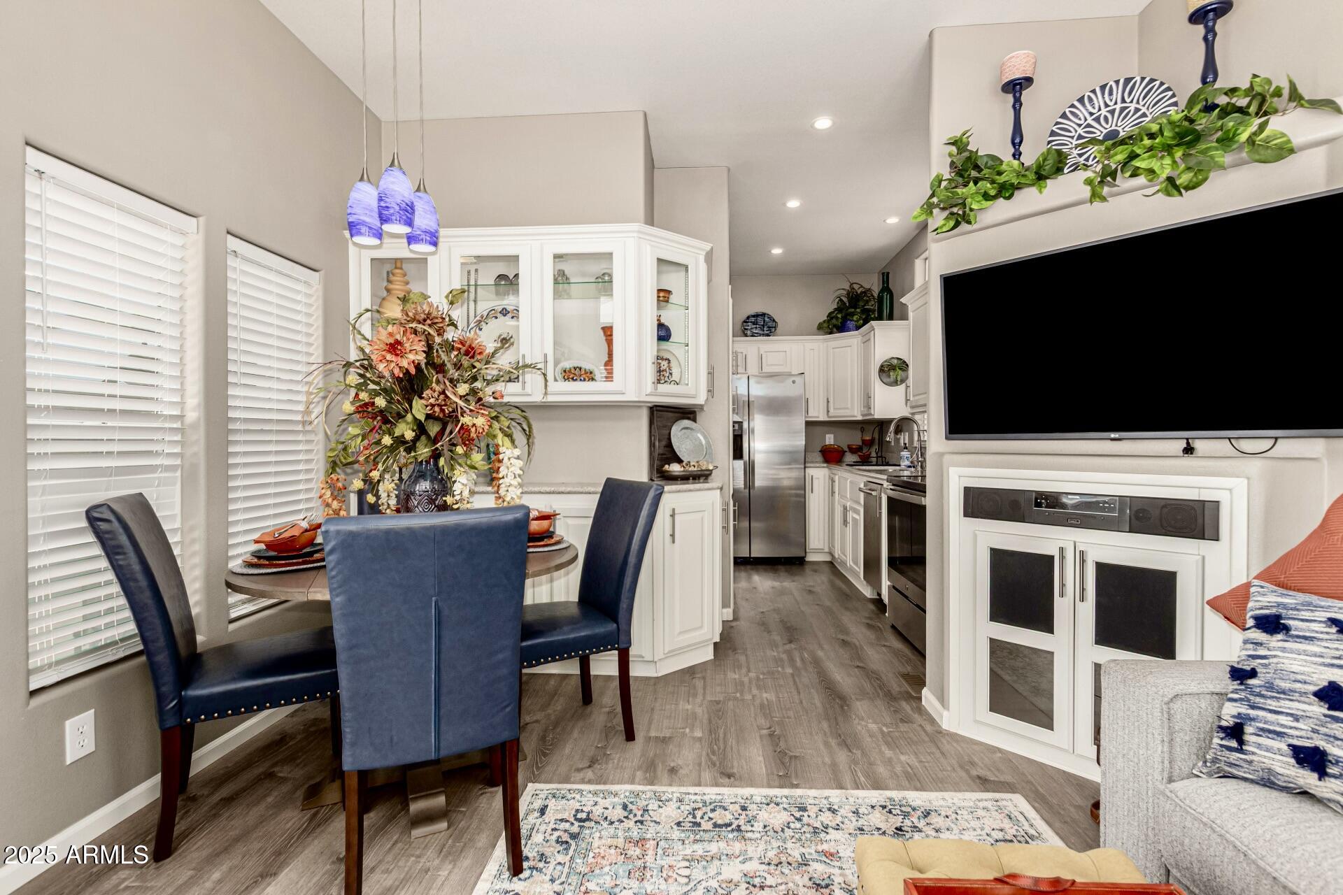 1374 West Chesapeake Avenue Apache Junction, AZ 85119 - Photo 14 of 33 a living room with furniture and a flat screen tv