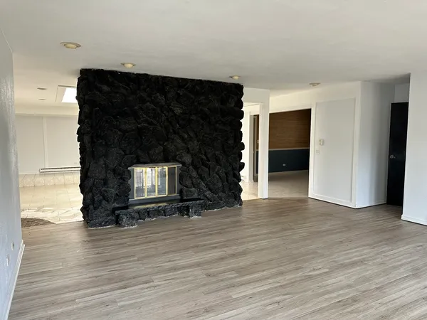 a living room with wooden floor