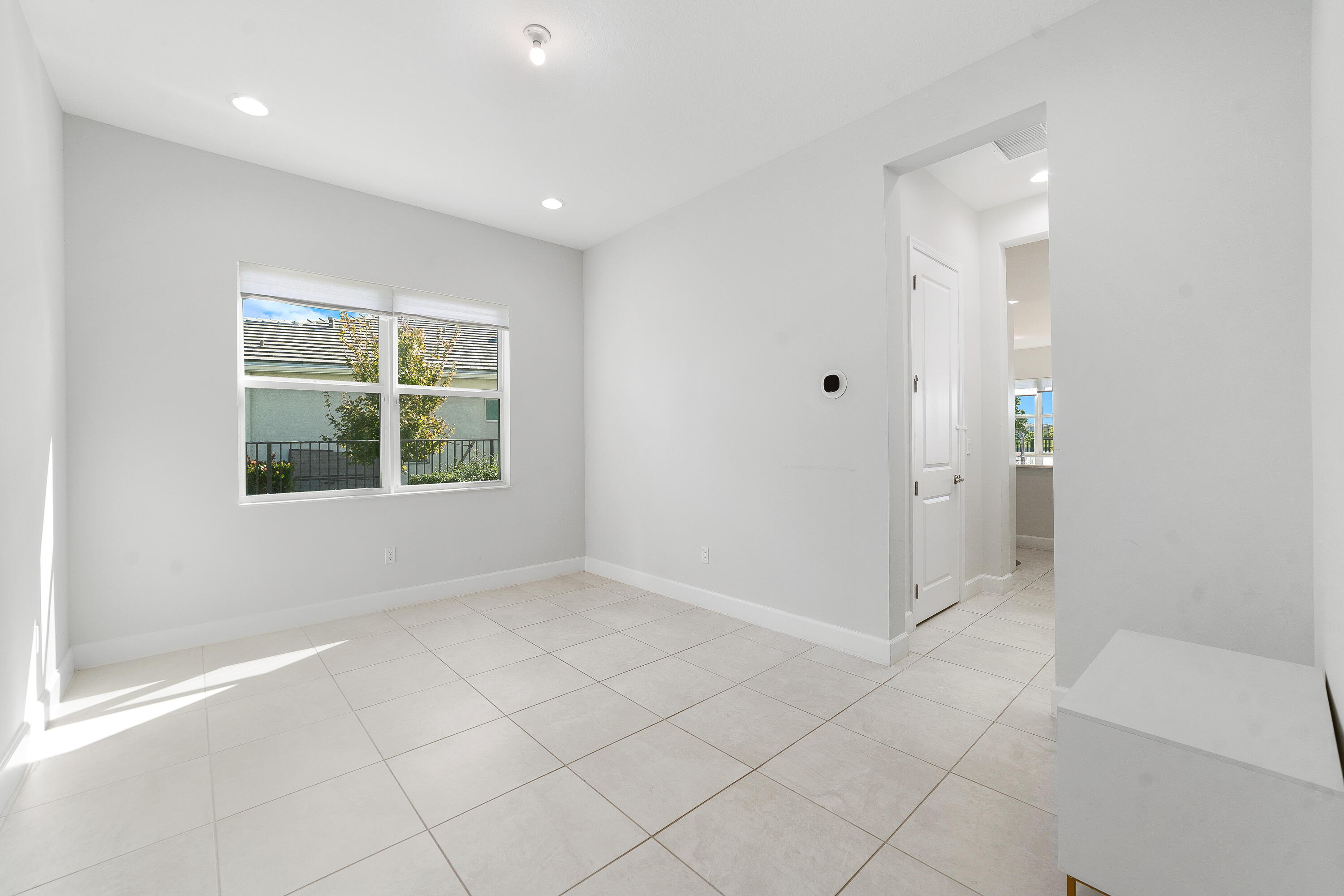 5487 Macoon Way Loxahatchee, FL 33470 - Photo 20 of 66 an empty room with windows and closet