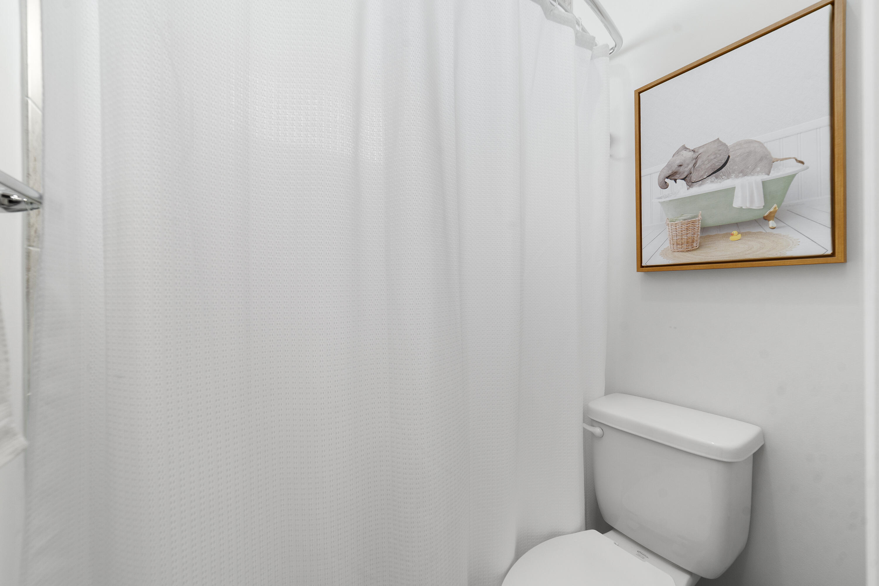 5487 Macoon Way Loxahatchee, FL 33470 - Photo 30 of 66 a white toilet sitting next to a white wall