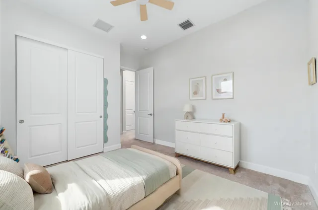 a bathroom with a granite countertop sink mirror and double
