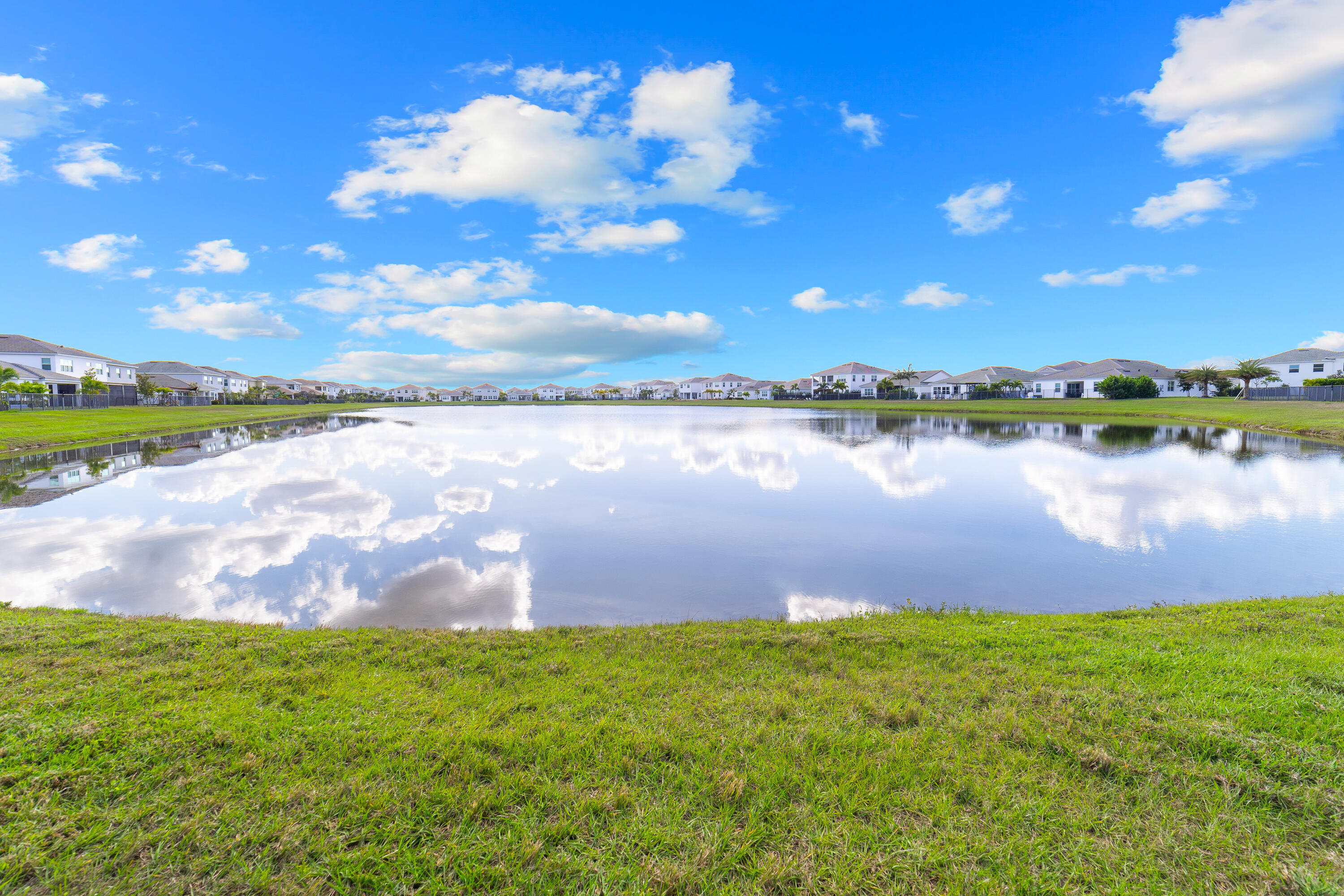 5487 Macoon Way Loxahatchee, FL 33470 - Photo 52 of 66 a view of a lake with a lake in the background