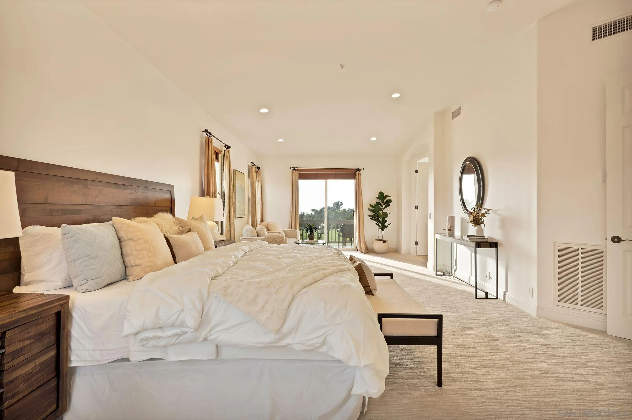 698 Cypress Hills Drive Encinitas, CA 92024 - Photo 29 of 44 a bed room with a bed and a chair