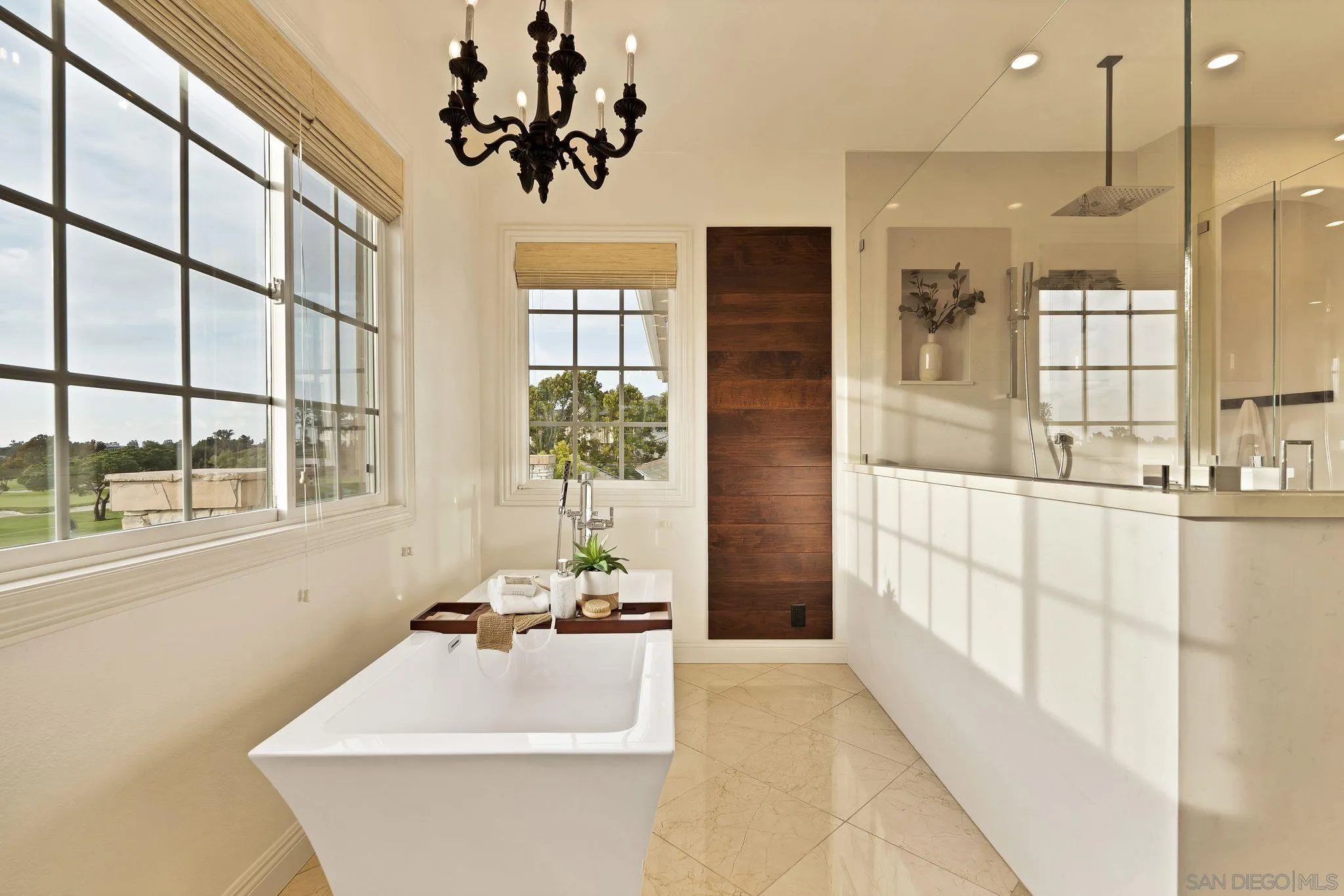 698 Cypress Hills Drive Encinitas, CA 92024 - Photo 34 of 44 a bathroom with a tub sink and mirror