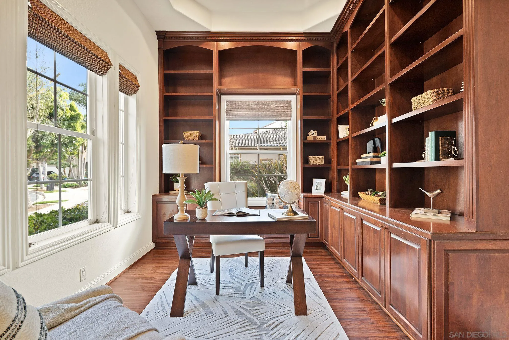 698 Cypress Hills Drive Encinitas, CA 92024 - Photo 6 of 44 a room with wooden floor and windows