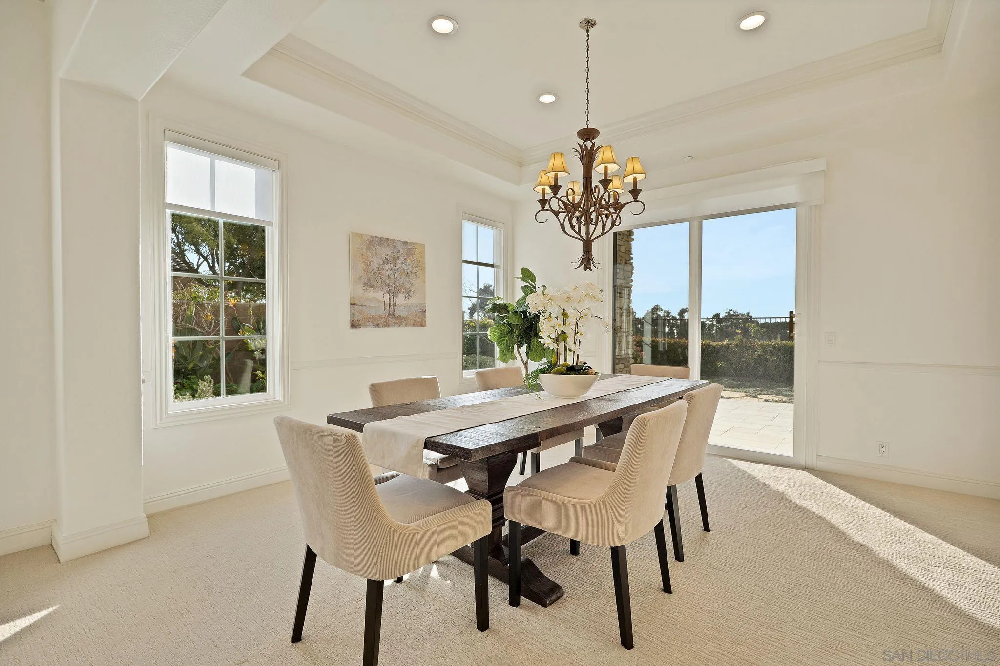 698 Cypress Hills Drive Encinitas, CA 92024 - Photo 10 of 44 a view of a dining room with furniture window and outside view