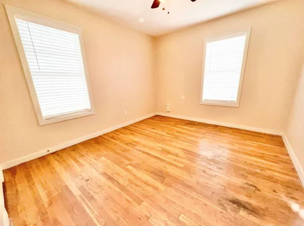 a view of an empty room and window