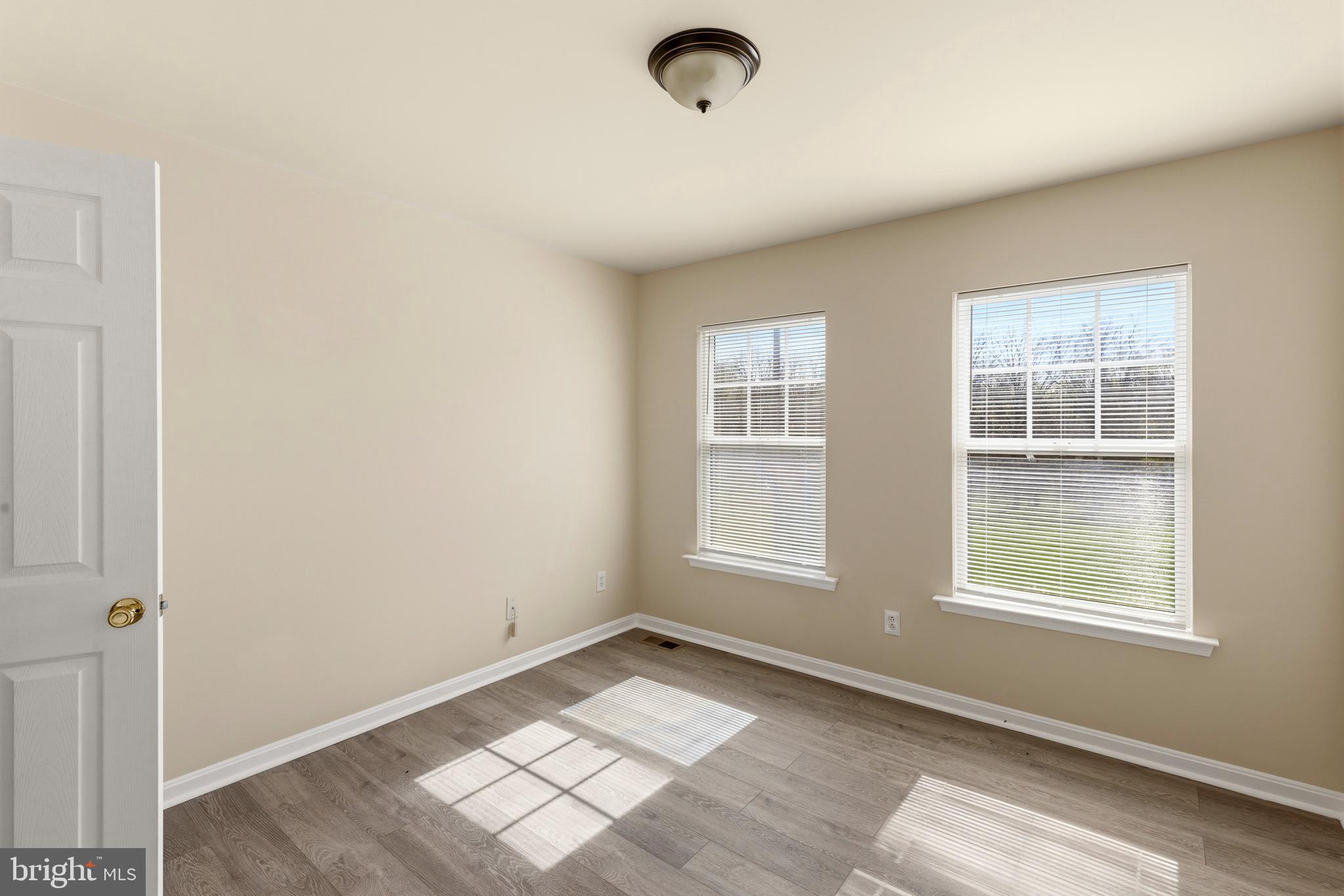4704 Denview Way Baltimore, MD 21206 - Photo 19 of 42 an empty room with windows