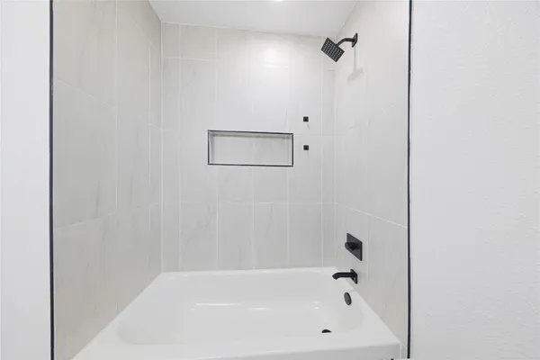 a bathroom with a bathtub