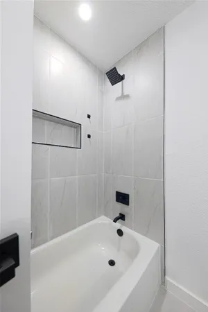a bathroom with a bathtub
