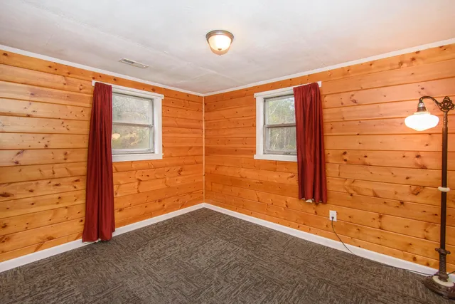 a view of an empty room and window