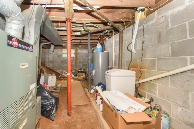 a view of a patio with a chairs and potted plants