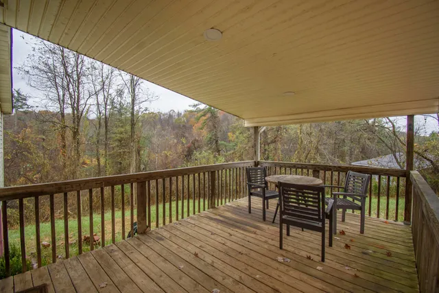 a view of a two chairs in the balcony