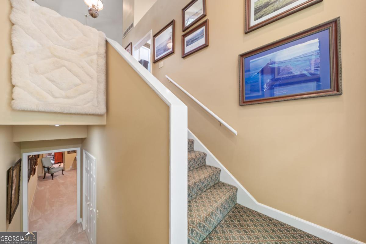 1031 Old Still Road Greensboro, GA 30642 - Photo 47 of 73 a view of a hallway with staircase
