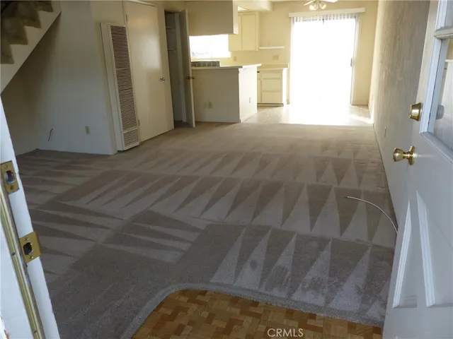 a view of a bathroom with a sink and a window