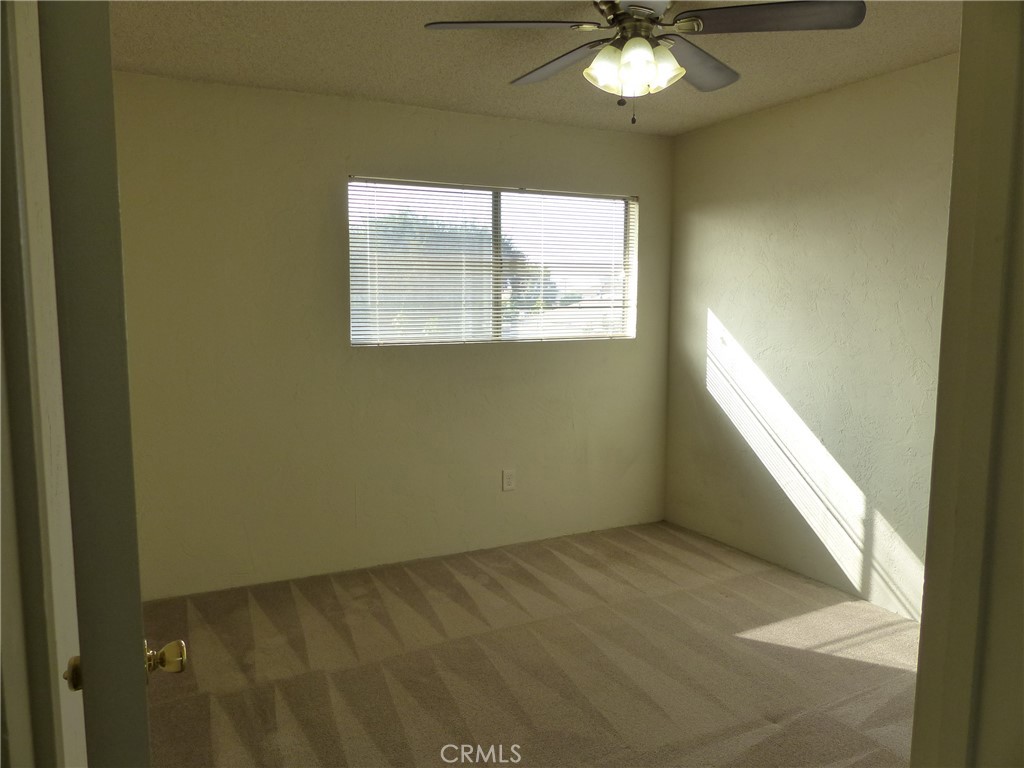 10708 Walnut Street Los Alamitos, CA 90720 - Photo 9 of 13 a view of an empty room with a window