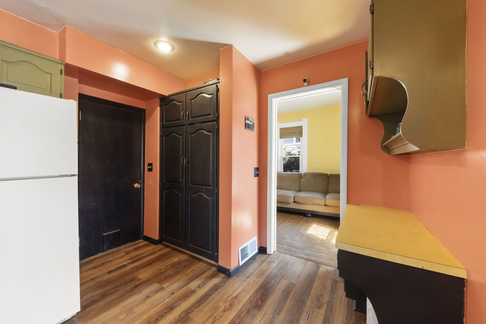 208 West Locust Street DeKalb, IL 60115 - Photo 11 of 26 a view of hallway with wooden floor