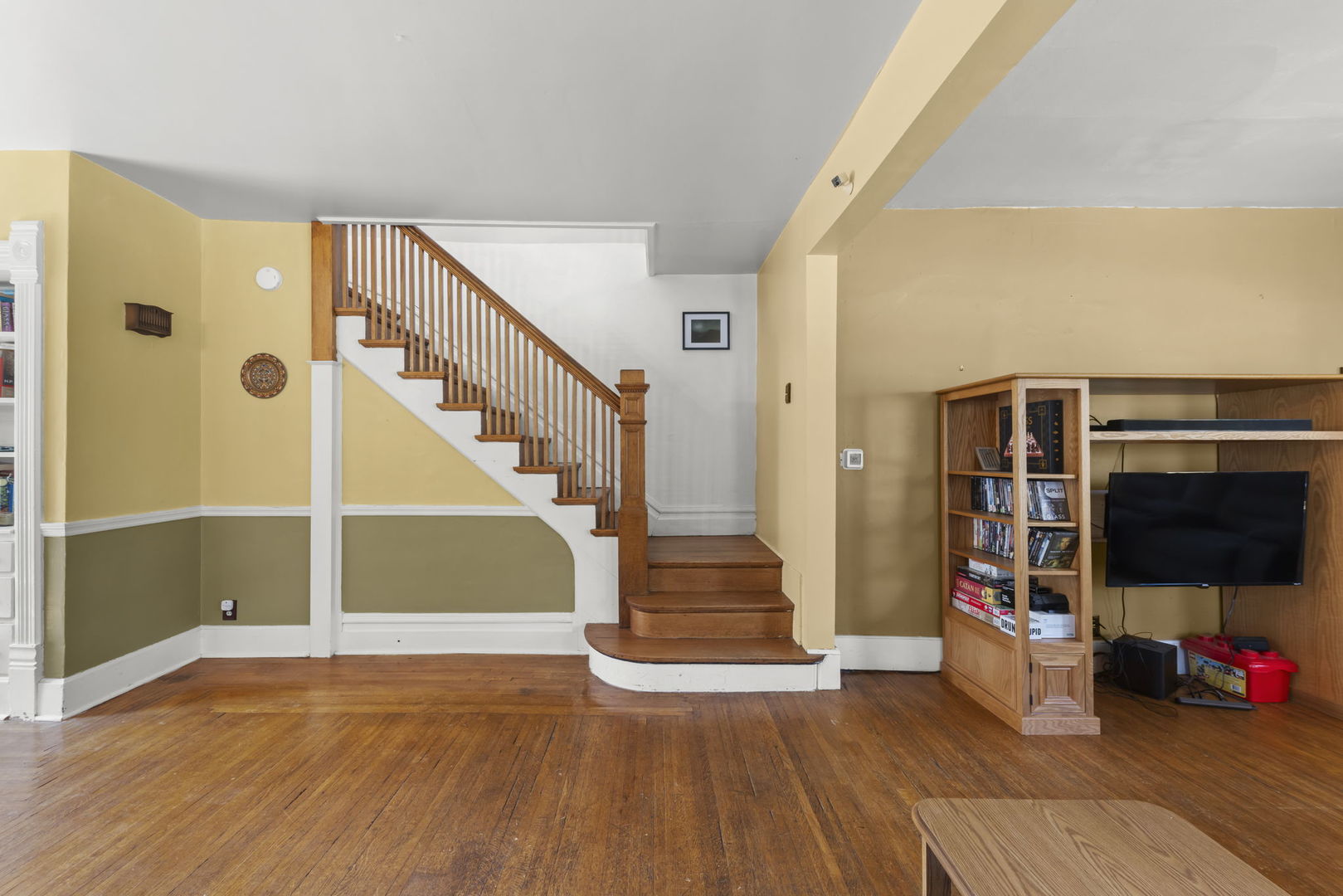 208 West Locust Street DeKalb, IL 60115 - Photo 2 of 26 a view of entryway and hall with wooden floor