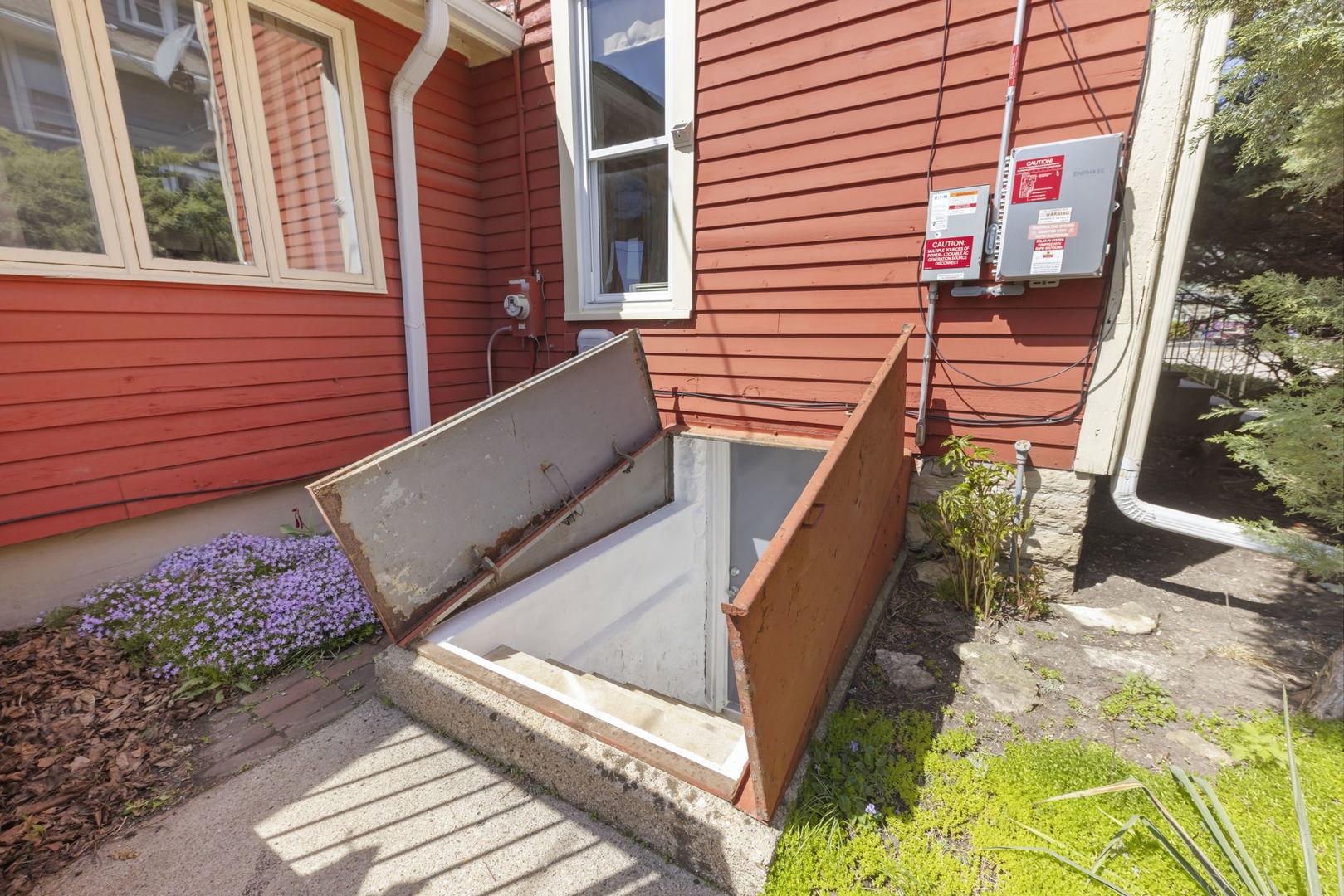 208 West Locust Street DeKalb, IL 60115 - Photo 24 of 26 a view of a patio with two chairs and a potted plant