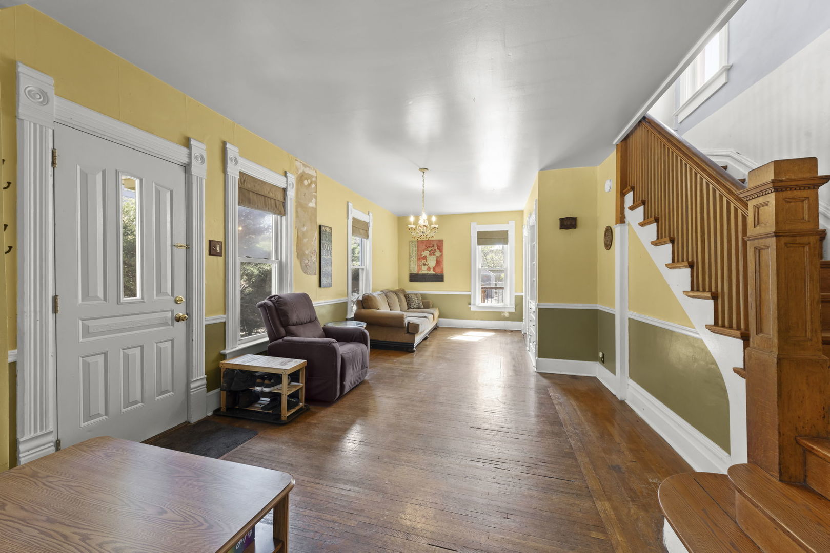 208 West Locust Street DeKalb, IL 60115 - Photo 3 of 26 a living room with furniture