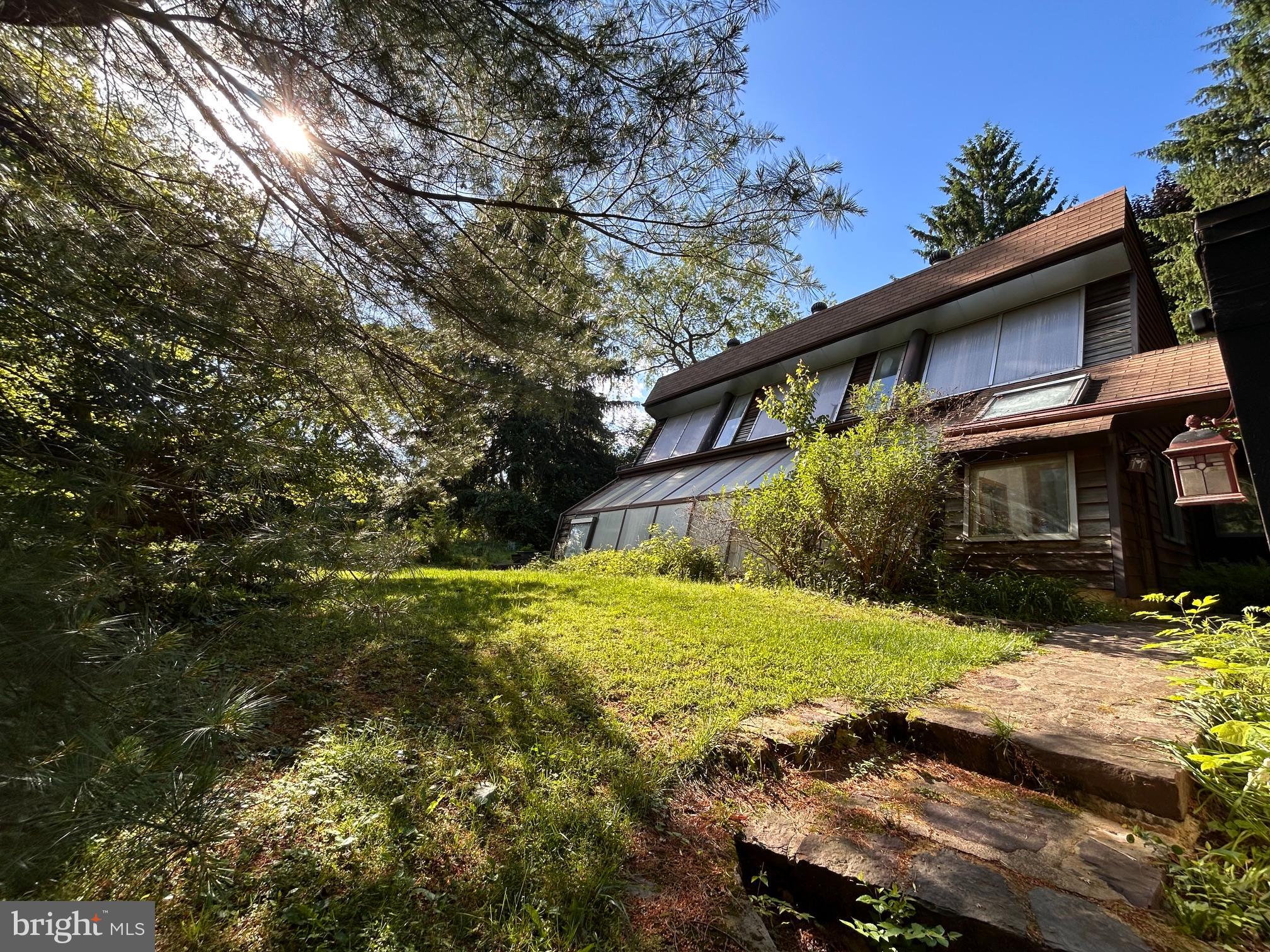 8204 Brookside Road Elkins Park, PA 19027 - Photo 18 of 20 a front view of house with yard