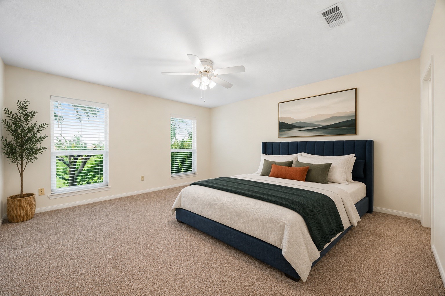 3530 Katy Hockley Road Katy, TX 77493 - Photo 10 of 25 a spacious bedroom with a large bed and a window