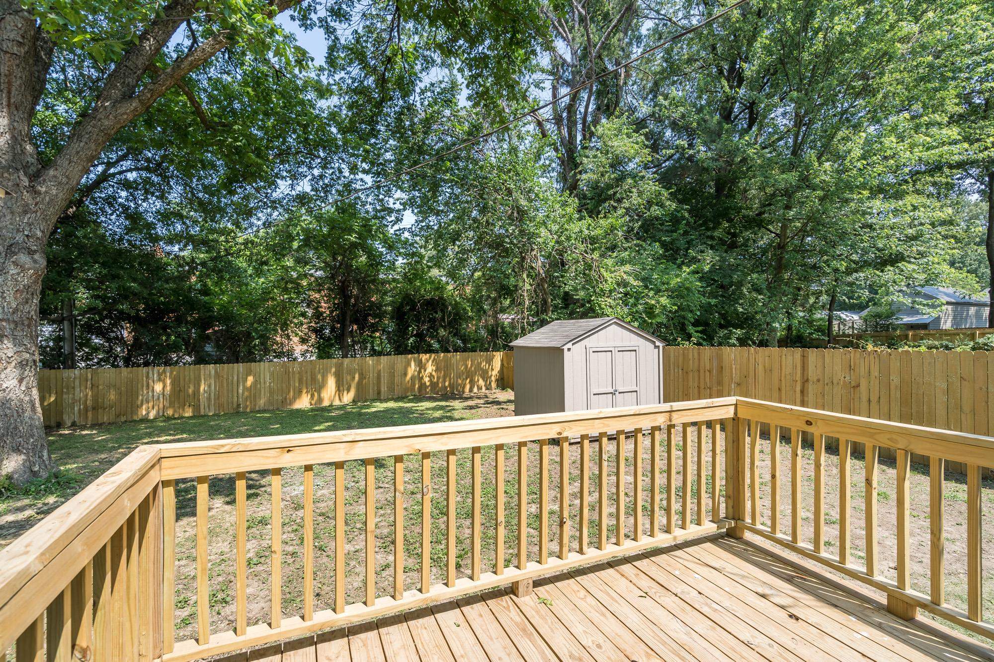 1014 Wellsville Road Memphis, TN 38117 - Photo 22 of 25 a view of balcony with wooden floor and fence