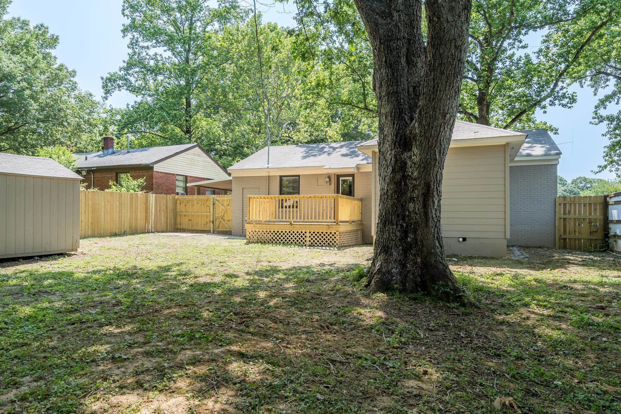 1014 Wellsville Road Memphis, TN 38117 - Photo 24 of 25 a view of a house with a yard