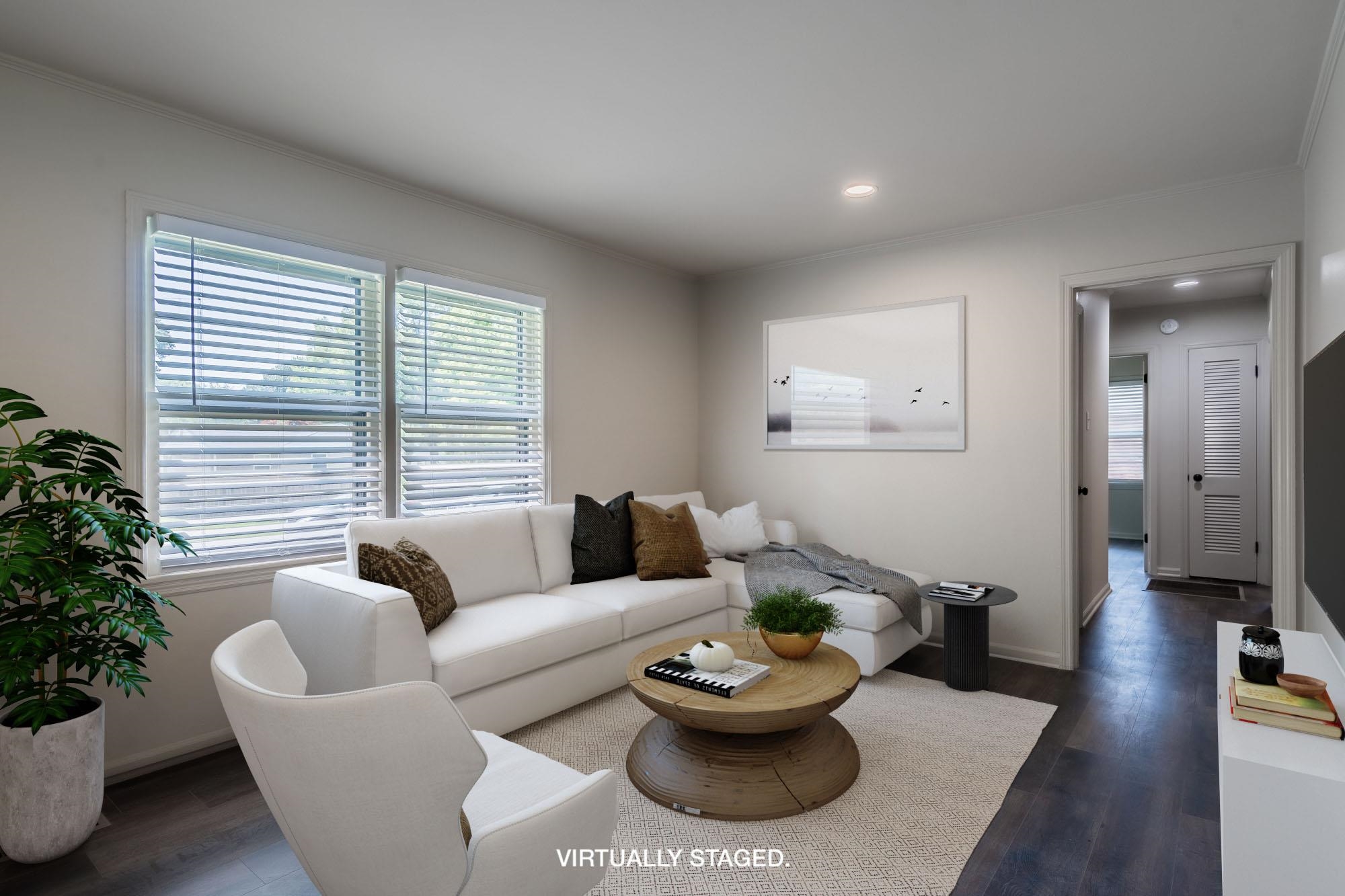 1014 Wellsville Road Memphis, TN 38117 - Photo 3 of 25 a living room with furniture and a potted plant