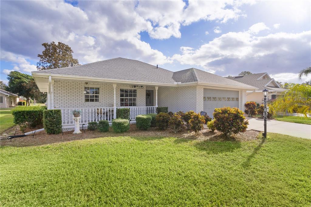 950 Beaver Run Tavares, FL 32778 - Photo 1 of 1 a house view with a garden space