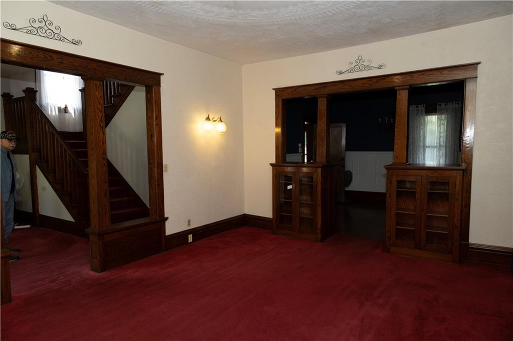 513 Lambertsville Road Stoystown, PA 15563 - Photo 12 of 49 a view of a livingroom with furniture and staircase