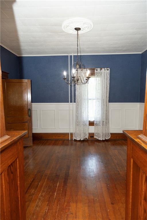 513 Lambertsville Road Stoystown, PA 15563 - Photo 15 of 49 a view of an empty room with wooden floor and a window