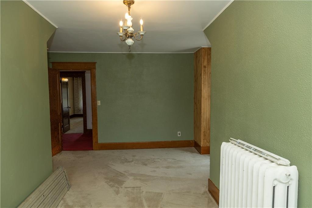 513 Lambertsville Road Stoystown, PA 15563 - Photo 27 of 49 a view of a hallway with a chandelier