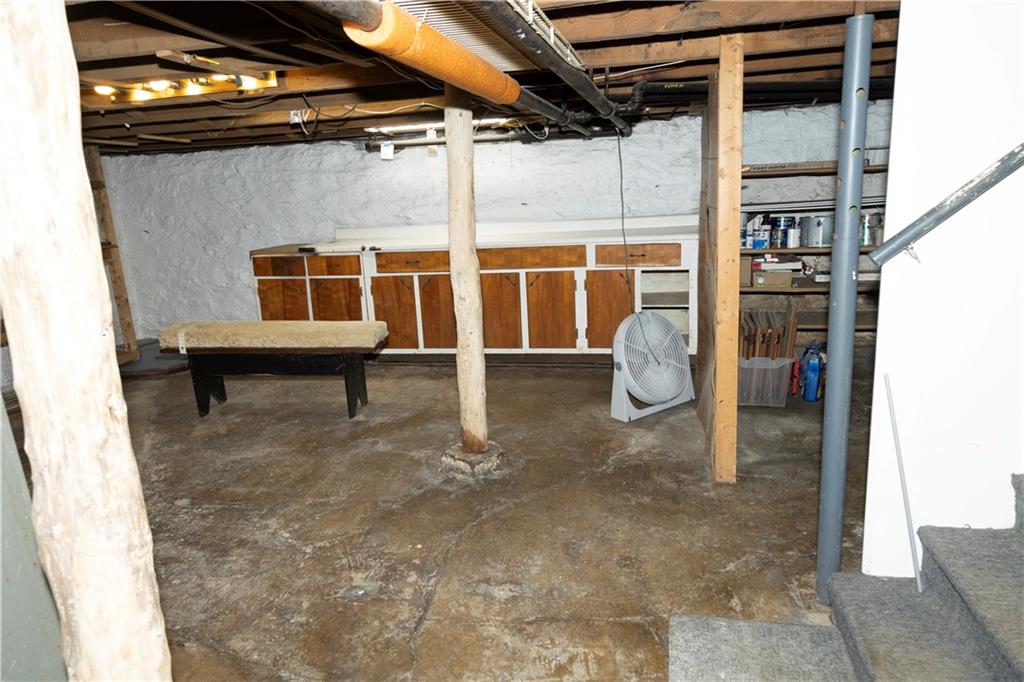 513 Lambertsville Road Stoystown, PA 15563 - Photo 45 of 49 a backyard of a house with barbeque oven and outdoor seating