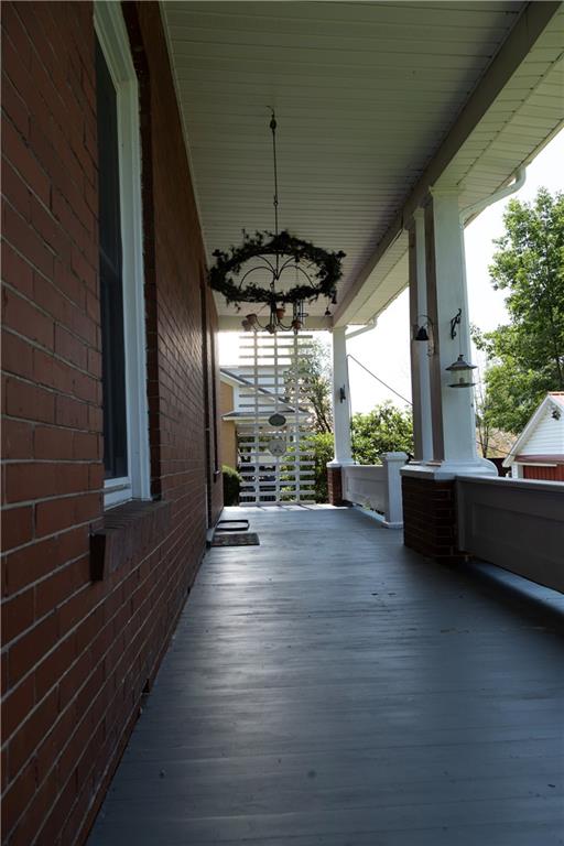 513 Lambertsville Road Stoystown, PA 15563 - Photo 46 of 49 a view of a porch with furniture and a yard