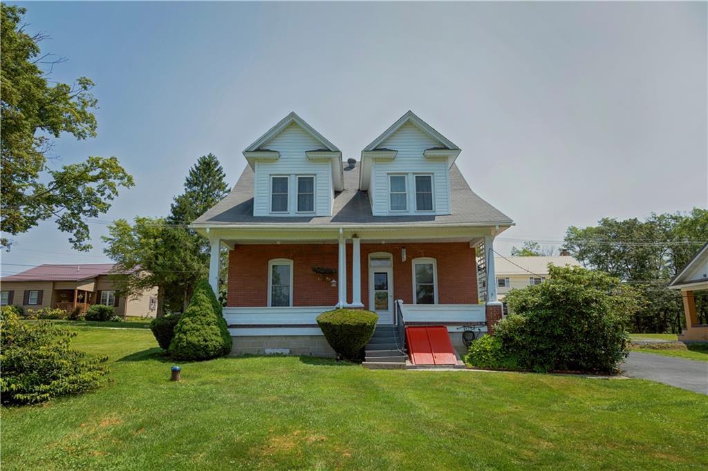 513 Lambertsville Road Stoystown, PA 15563 - Photo 47 of 49 a front view of a house with garden