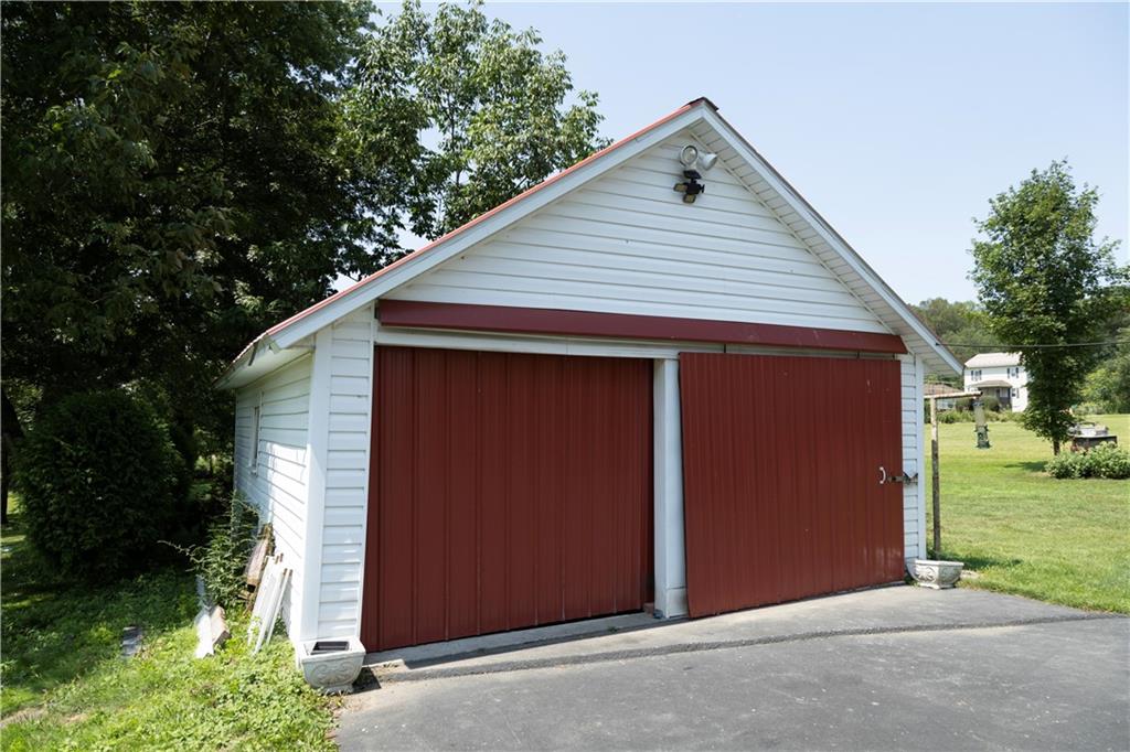 513 Lambertsville Road Stoystown, PA 15563 - Photo 5 of 49 a backyard of a house with lots of green space