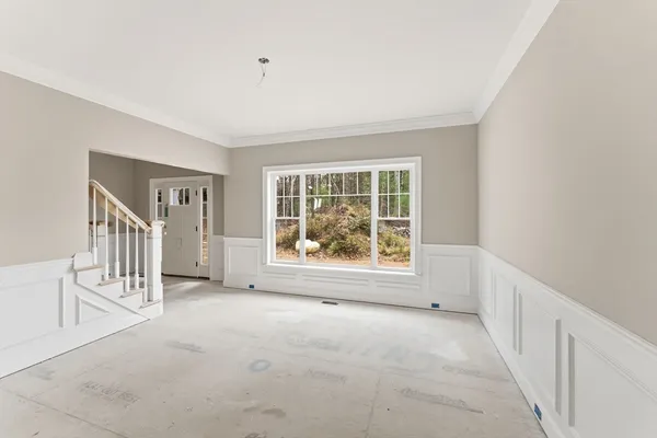a view of an empty room with a window