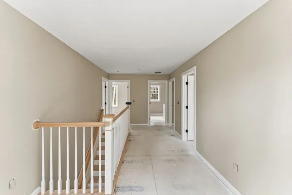 a view of a hallway with closet