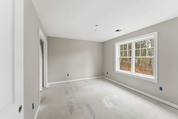 an empty room with a window