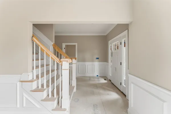 a view of entryway with wooden floor