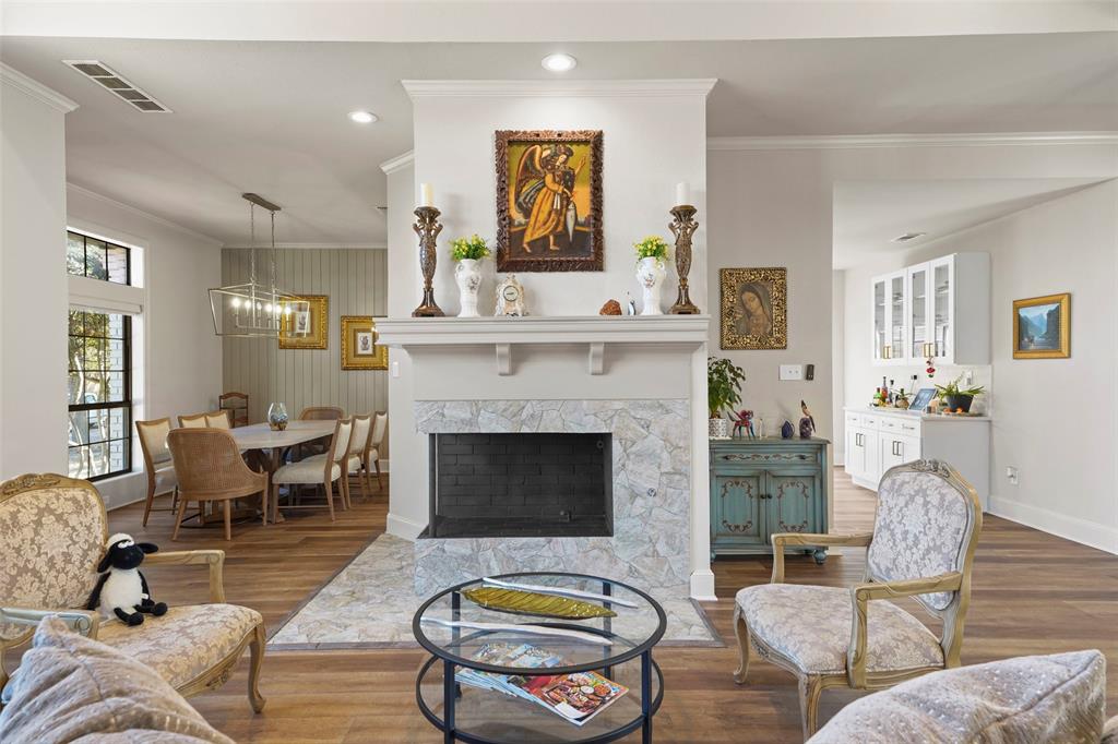 1413 Windsor Way Rowlett, TX 75088 - Photo 11 of 38 a living room with furniture and a fireplace