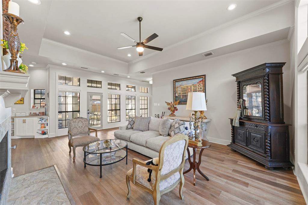 1413 Windsor Way Rowlett, TX 75088 - Photo 12 of 38 a living room with furniture and a wooden floor