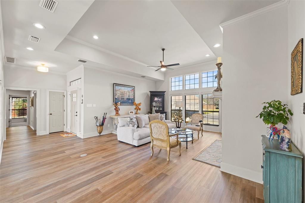 1413 Windsor Way Rowlett, TX 75088 - Photo 13 of 38 a living room with furniture and a potted plant
