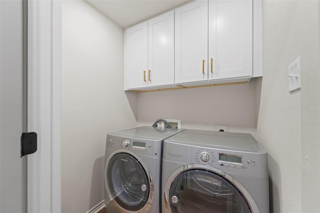 1413 Windsor Way Rowlett, TX 75088 - Photo 29 of 38 a utility room with dryer and washer