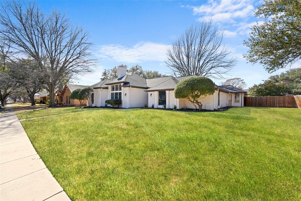 1413 Windsor Way Rowlett, TX 75088 - Photo 3 of 38 a front view of house with yard