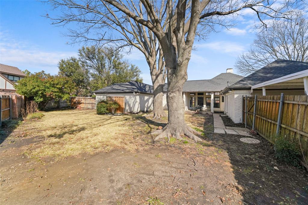 1413 Windsor Way Rowlett, TX 75088 - Photo 32 of 38 a view of a house with a yard