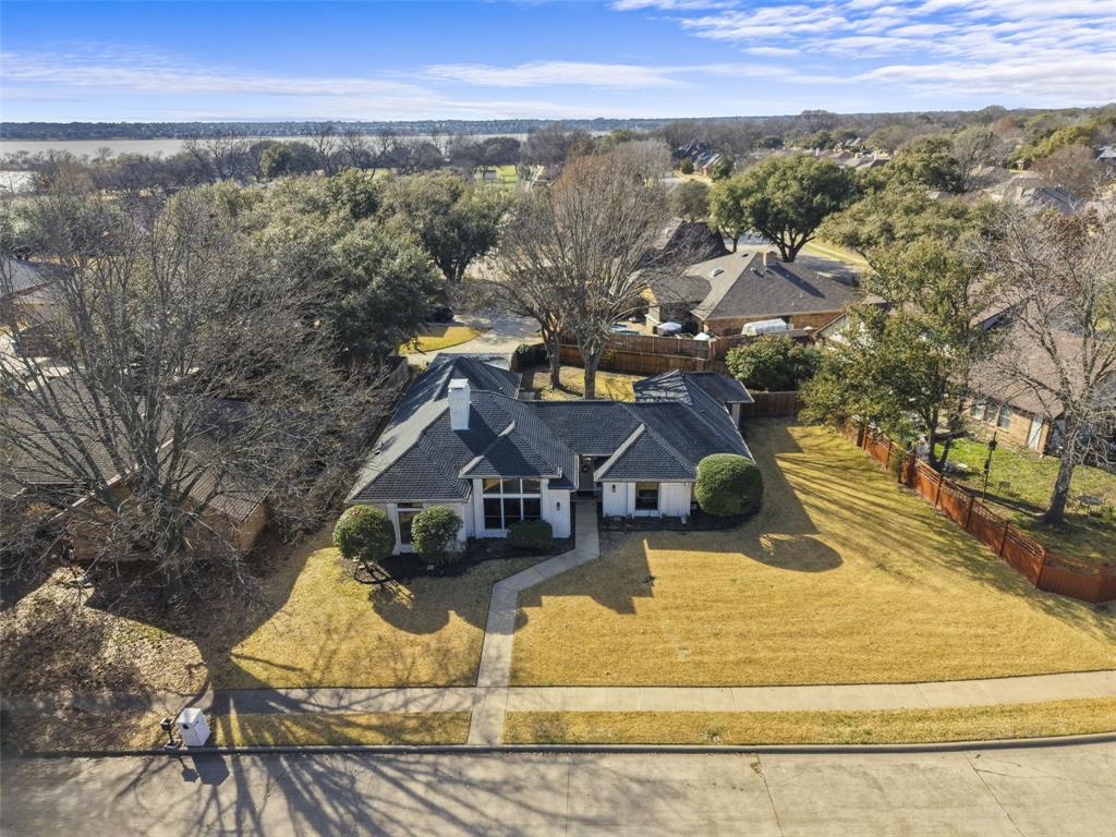 1413 Windsor Way Rowlett, TX 75088 - Photo 33 of 38 a view of a house with a yard