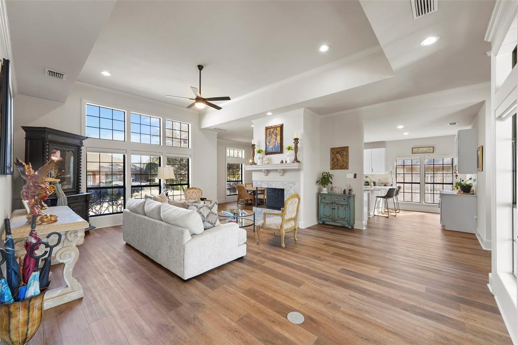 1413 Windsor Way Rowlett, TX 75088 - Photo 10 of 38 a living room with fireplace furniture and a wooden floor
