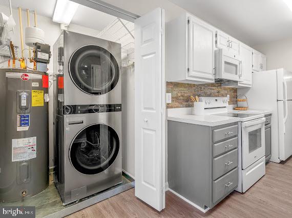 203 Star Pointe Court, Unit 2C Abingdon, MD 21009 - Photo 13 of 29 a utility room with sink dryer and washer